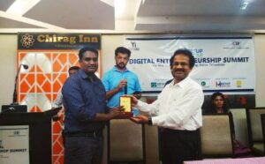 Rajeesh Envara receiving Digital Entrepreneurship Award from Dr Jyothi Sankar ITS  Envara